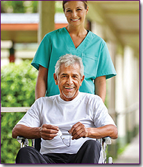 image of a nurse pushing a patient in a wheel chair